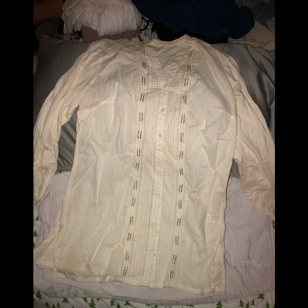 Off white long sleeve button down shirt.